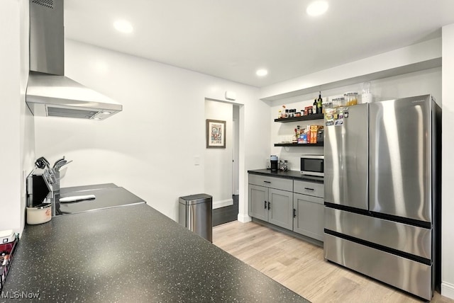 13806 Carpenter Rd, Garfield Heights, OH 44125 - kitchen featuring appliances with stainless steel finishes, wall chimney range hood, dark countertops, recessed lighting, and open shelves