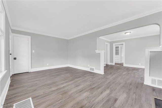 3670 E 138th St, Cleveland, OH 44120 - unfurnished living room featuring wood finished floors and crown molding