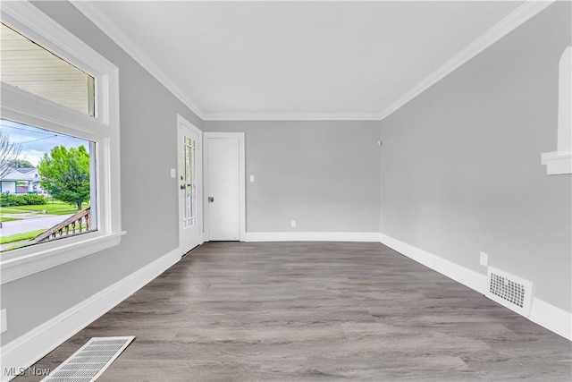3670 E 138th St, Cleveland, OH 44120 - empty room featuring crown molding and wood finished floors