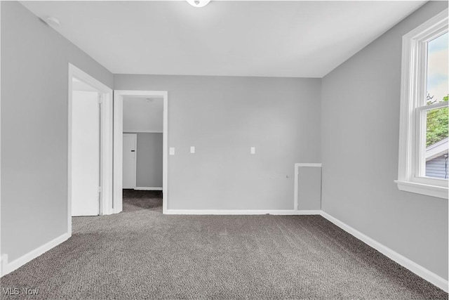 3670 E 138th St, Cleveland, OH 44120 - empty room with carpet flooring and a smoke detector