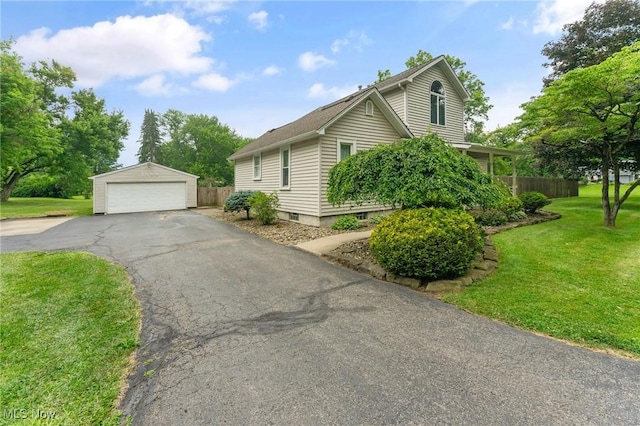 1500 Furnace St, Mineral Ridge, OH 44440 - view of front of home featuring an outdoor structure and a garage