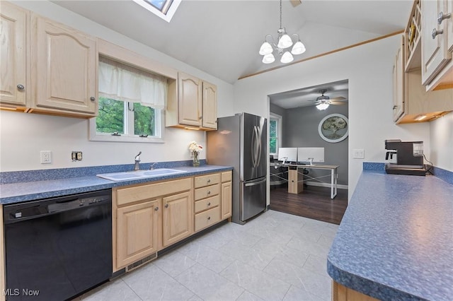 1500 Furnace St, Mineral Ridge, OH 44440 - kitchen featuring black dishwasher, freestanding refrigerator, light brown cabinets, lofted ceiling, and dark countertops