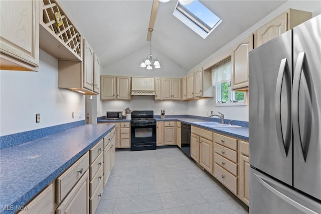 1500 Furnace St, Mineral Ridge, OH 44440 - kitchen featuring black appliances, light brown cabinets, a skylight, dark countertops, and light tile patterned floors
