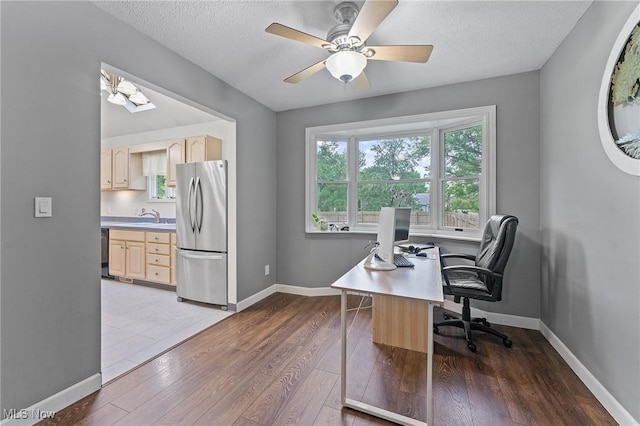 1500 Furnace St, Mineral Ridge, OH 44440 - office space featuring wood finished floors, a textured ceiling, and ceiling fan