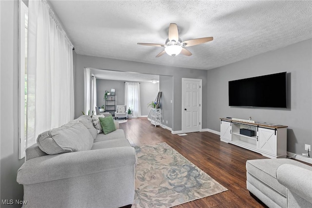 1500 Furnace St, Mineral Ridge, OH 44440 - living room with ceiling fan, wood finished floors, and a textured ceiling