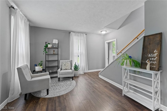 1500 Furnace St, Mineral Ridge, OH 44440 - sitting room with a textured ceiling and wood finished floors