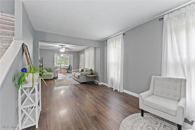 1500 Furnace St, Mineral Ridge, OH 44440 - living room with hardwood / wood-style flooring, stairway, and a ceiling fan