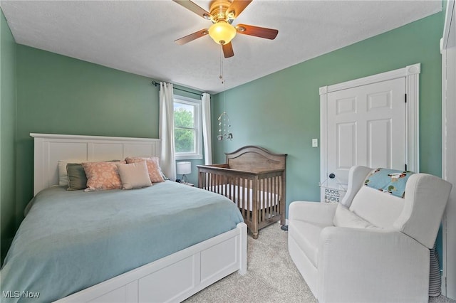 1500 Furnace St, Mineral Ridge, OH 44440 - bedroom featuring light colored carpet and a ceiling fan