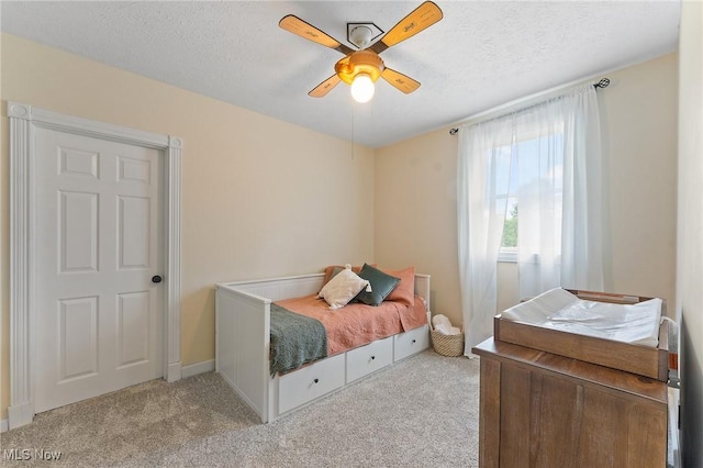 1500 Furnace St, Mineral Ridge, OH 44440 - bedroom with carpet, a textured ceiling, and a ceiling fan
