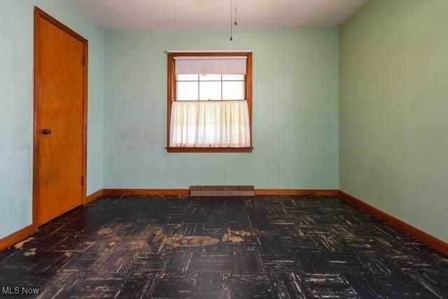 427 E 275th St, Euclid, OH 44132 - unfurnished room featuring baseboards