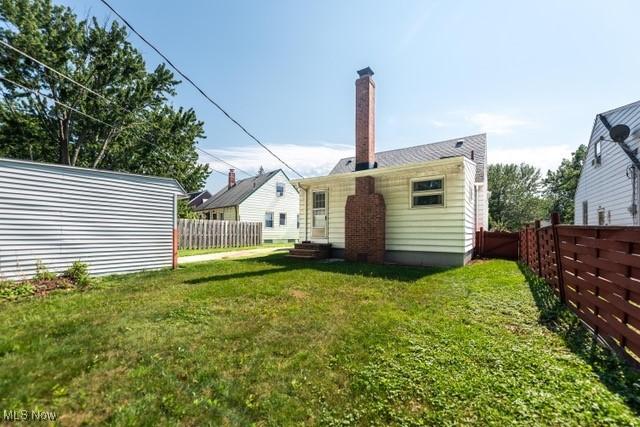 427 E 275th St, Euclid, OH 44132 - back of property featuring a chimney