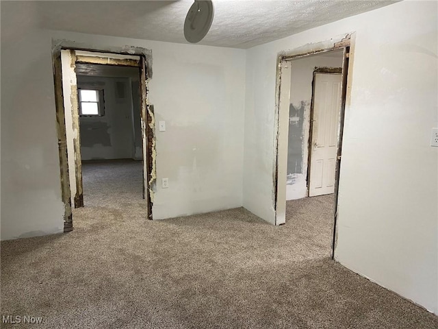 1122 W 17th St, Lorain, OH 44052 - carpeted empty room featuring a textured ceiling