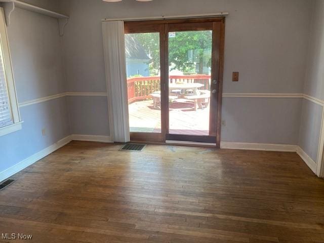 911 32nd St, Parkersburg, WV 26104 - spare room with wood finished floors and baseboards