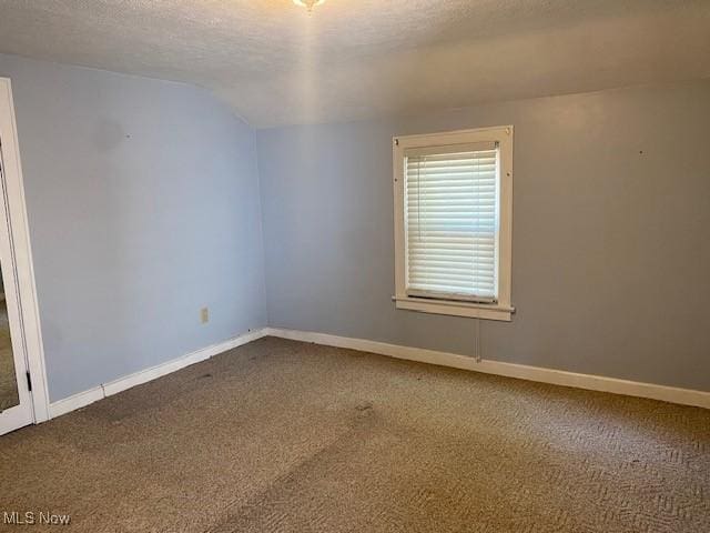 911 32nd St, Parkersburg, WV 26104 - unfurnished room with carpet floors and a textured ceiling