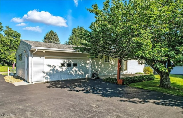 1808 Depot Rd, Salem, OH 44460 - view of front of property with an attached garage and asphalt driveway