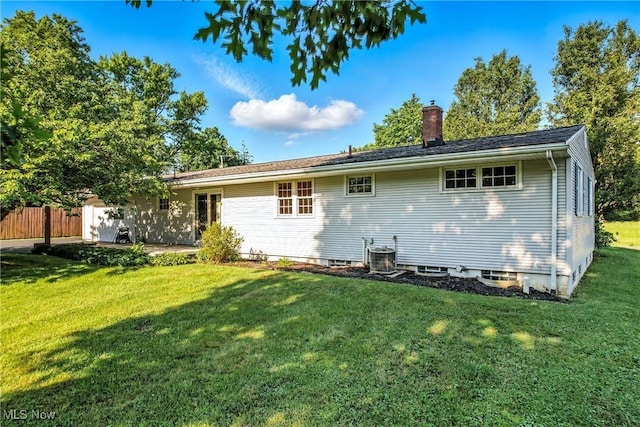 1808 Depot Rd, Salem, OH 44460 - rear view of house featuring a chimney and a patio area