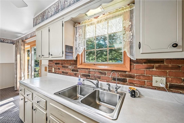 1808 Depot Rd, Salem, OH 44460 - kitchen featuring light countertops, carpet flooring, white cabinetry, and wainscoting