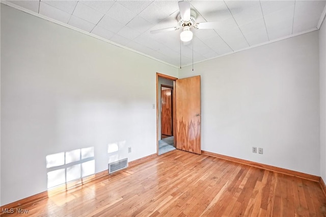 1808 Depot Rd, Salem, OH 44460 - spare room featuring ornamental molding, ceiling fan, and hardwood / wood-style flooring