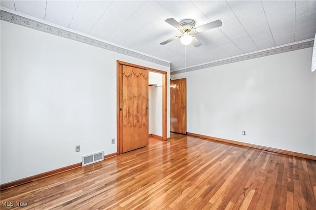 1808 Depot Rd, Salem, OH 44460 - spare room featuring light wood finished floors, a ceiling fan, and crown molding