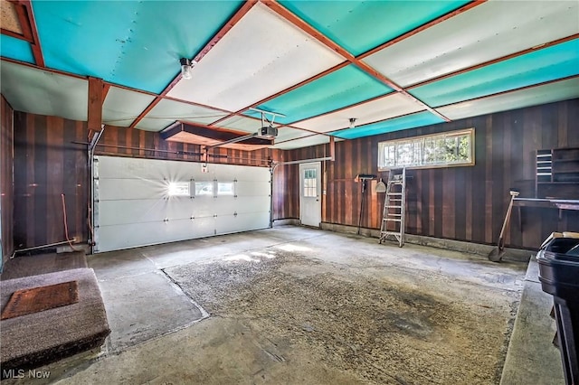 1808 Depot Rd, Salem, OH 44460 - garage featuring a garage door opener and wood walls