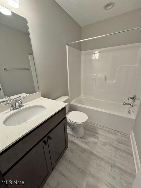 32054 Tuscan Ln Unit L-2, Avon Lake, OH 44012 - bathroom featuring vanity and bathing tub / shower combination