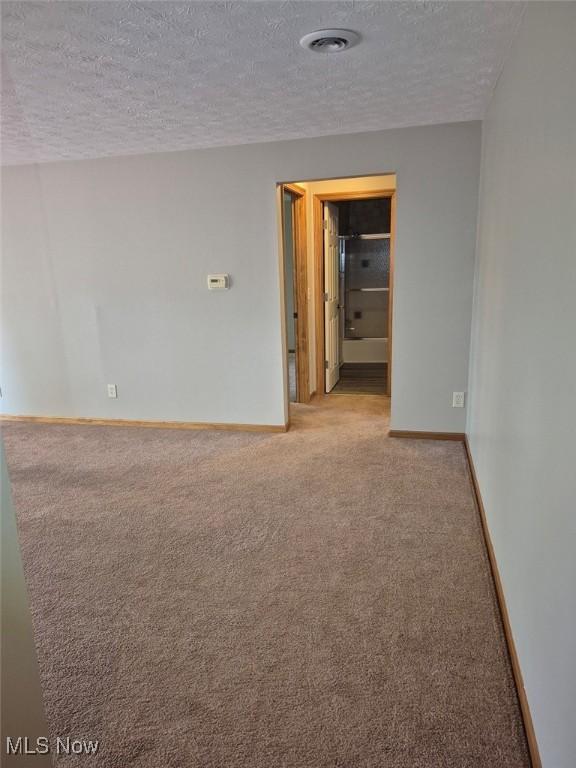 4360 Inner Circle Dr Unit C14, Brunswick, OH 44212 - unfurnished room featuring a textured ceiling and carpet