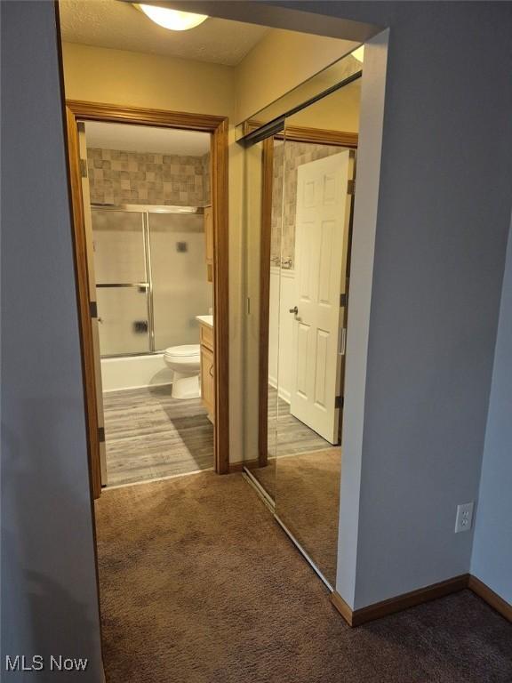 4360 Inner Circle Dr Unit C14, Brunswick, OH 44212 - hallway featuring carpet flooring and baseboards
