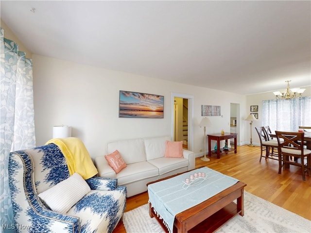 1907 Robindale St, Wickliffe, OH 44092 - living area with a chandelier and light wood-style flooring