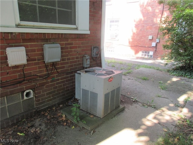 18019 Chagrin Blvd, Shaker Heights, OH 44122 - exterior view of a central air condition unit and brick siding