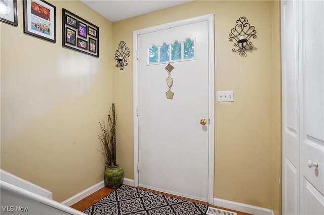 13 S River Rd, Munroe Falls, OH 44262 - doorway with baseboards and wood finished floors
