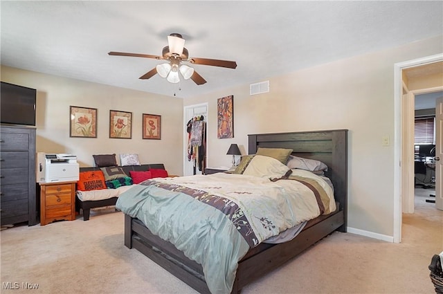13 S River Rd, Munroe Falls, OH 44262 - bedroom with light colored carpet, a ceiling fan, a closet, and a spacious closet
