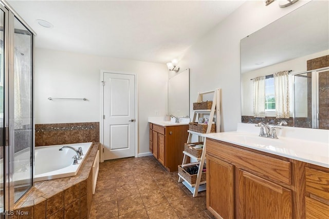 2979 Cloverhurst St NE, Canton, OH 44721 - full bath with a stall shower, a garden tub, and two vanities