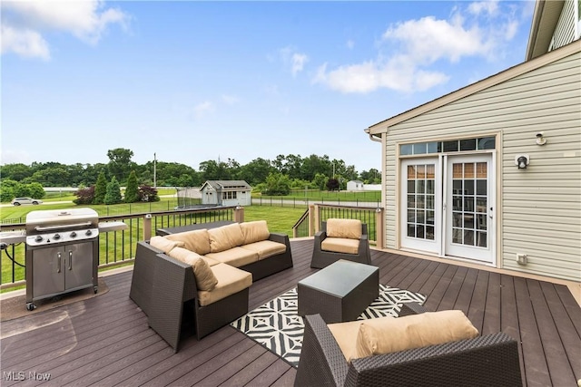2979 Cloverhurst St NE, Canton, OH 44721 - wooden deck featuring outdoor lounge area, a grill, and view of scattered trees