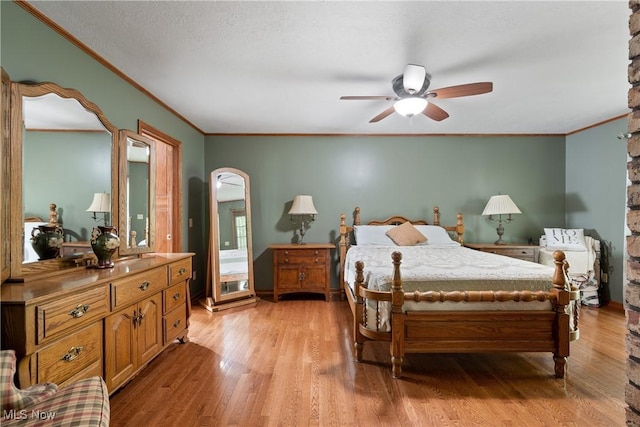 10400 Stoneacre St NW, Canal Fulton, OH 44614 - bedroom featuring crown molding, arched walkways, and light wood finished floors