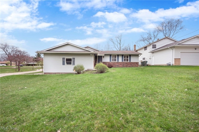 127 Brush Rd, Richmond Heights, OH 44143 - ranch-style home featuring a front yard, a garage, and a chimney