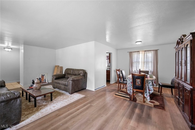 127 Brush Rd, Richmond Heights, OH 44143 - living room with wood finished floors and baseboards