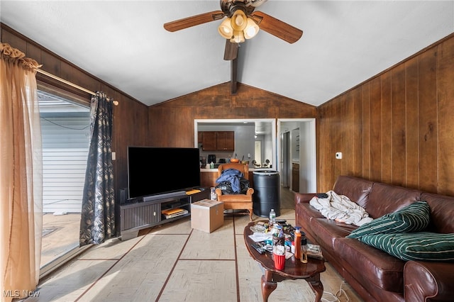 127 Brush Rd, Richmond Heights, OH 44143 - living room featuring wood walls and a ceiling fan