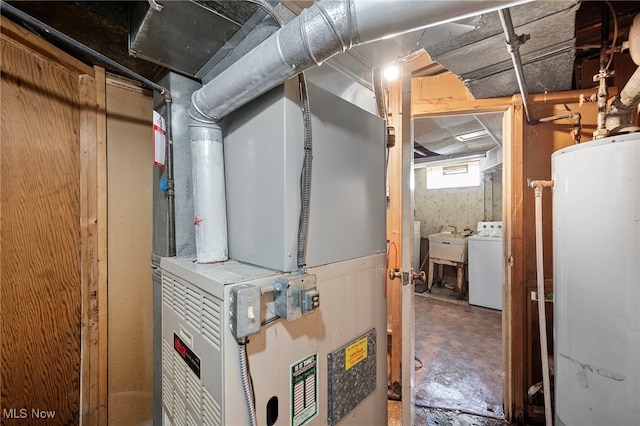 127 Brush Rd, Richmond Heights, OH 44143 - utility room with washer / clothes dryer, water heater, and heating unit