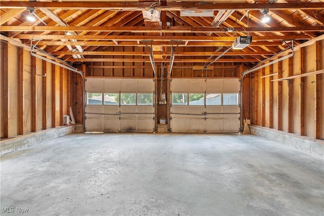 813 3rd St, Marietta, OH 45750 - garage featuring a garage door opener