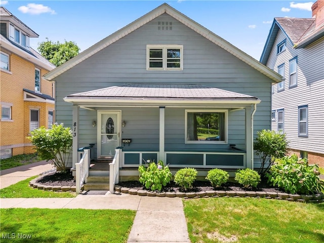 813 3rd St, Marietta, OH 45750 - view of front facade with a porch and a front yard