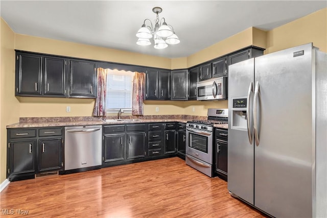 813 3rd St, Marietta, OH 45750 - kitchen with stainless steel appliances and dark cabinets