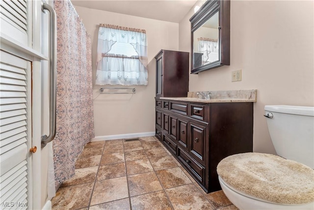 813 3rd St, Marietta, OH 45750 - bathroom with vanity and stone finish floors