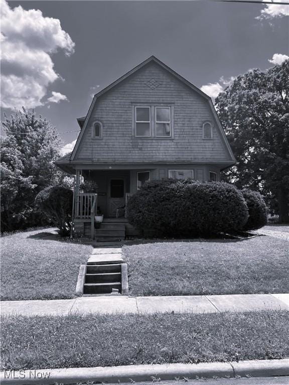 13 Neil St, Niles, OH 44446 - view of front of home with a gambrel roof and covered porch