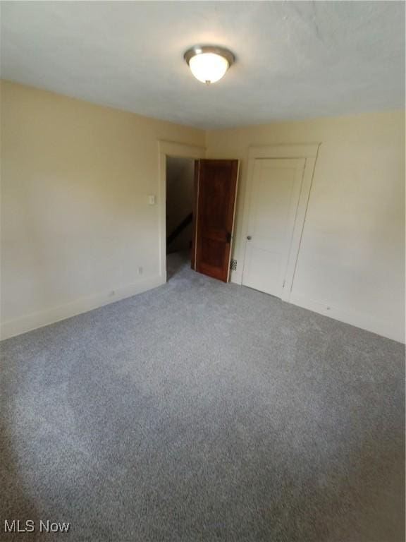 207 E Lucius Ave, Youngstown, OH 44507 - spare room featuring carpet flooring and baseboards
