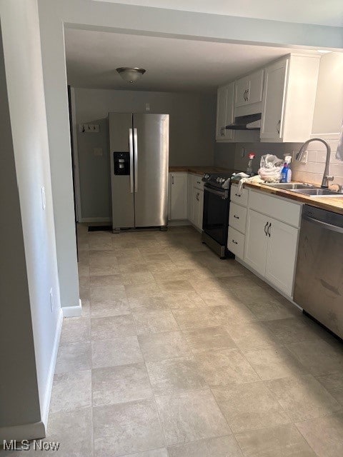206 Fowler, Cortland, OH 44410 - kitchen with stainless steel appliances and white cabinetry