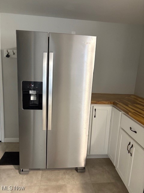 206 Fowler, Cortland, OH 44410 - kitchen with stainless steel fridge, white cabinets, and butcher block countertops