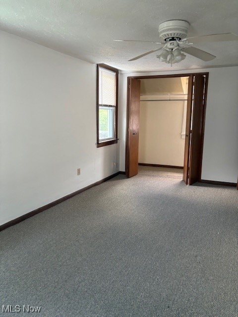 206 Fowler, Cortland, OH 44410 - unfurnished bedroom featuring light carpet, a closet, and a ceiling fan