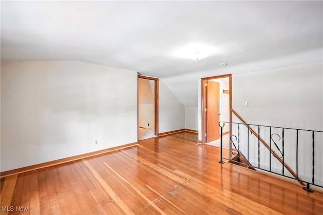 1683 Ridgewood Dr, Salem, OH 44460 - spare room featuring vaulted ceiling and light wood finished floors