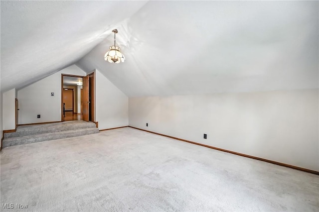 1683 Ridgewood Dr, Salem, OH 44460 - additional living space with carpet flooring and vaulted ceiling