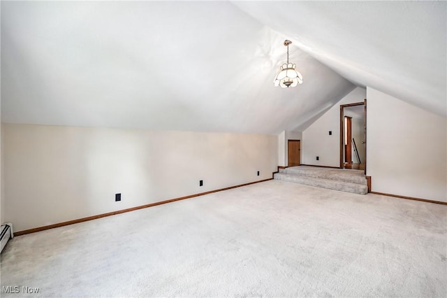 1683 Ridgewood Dr, Salem, OH 44460 - bonus room with lofted ceiling, carpet flooring, and baseboard heating